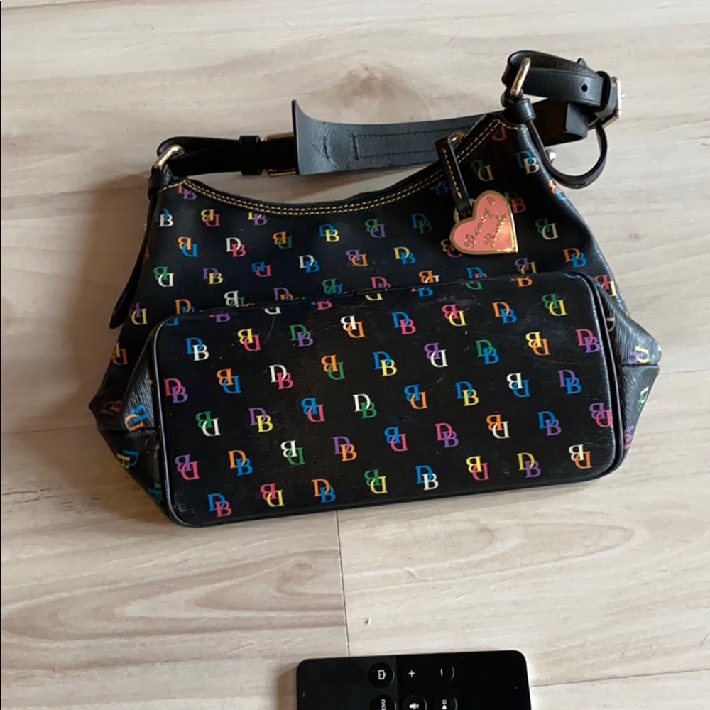 Larger used Dooney & Bourke in good condition. - Picture 1 of 3